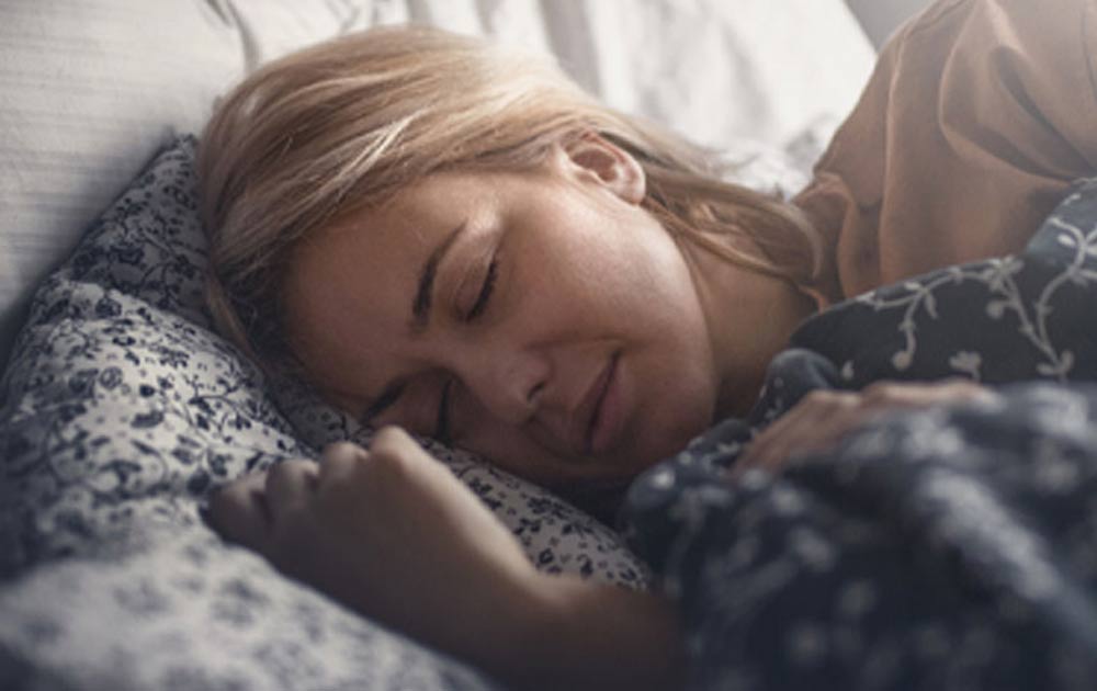 Bilde av dame som sover